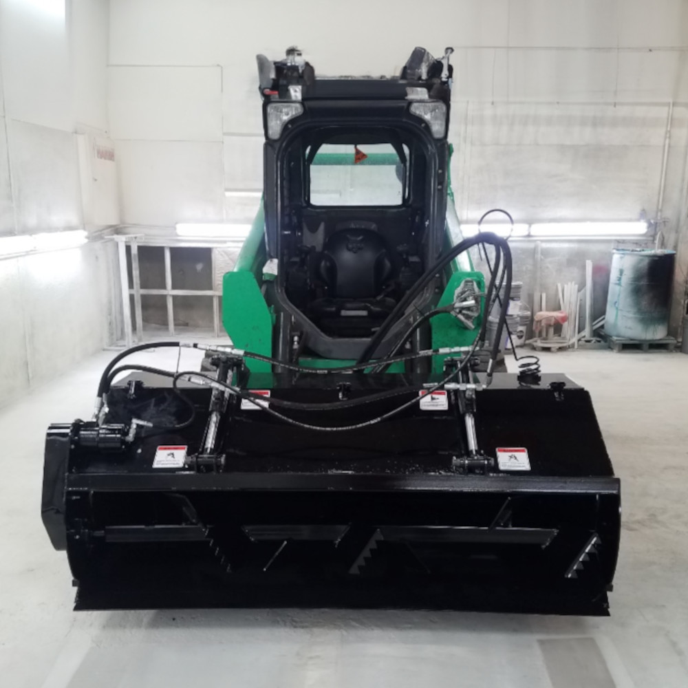 Skid Steer with Custom Manure Spreading Implement